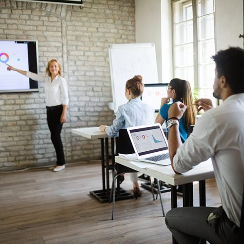 Business, technology and people concept – creative team or designers working in office Business, technology and people concept - creative team or designers working on user interface at office